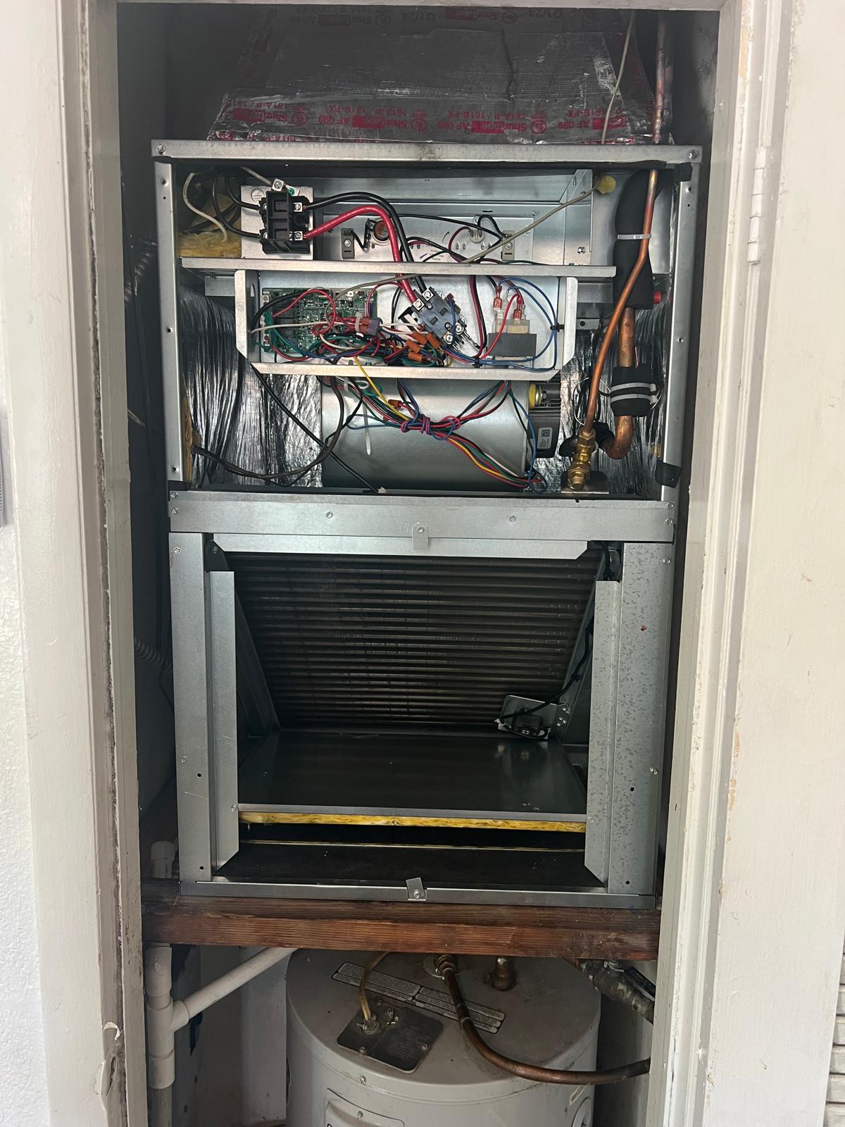 Reliable Furnace Repair And Heating Services In Hialeah Fl 1 - Reliable Furnace Repair And Heating Services In Hialeah Fl Technician Repairing A Furnace In Hialeah, Fl, Providing Reliable Heating Solutions.